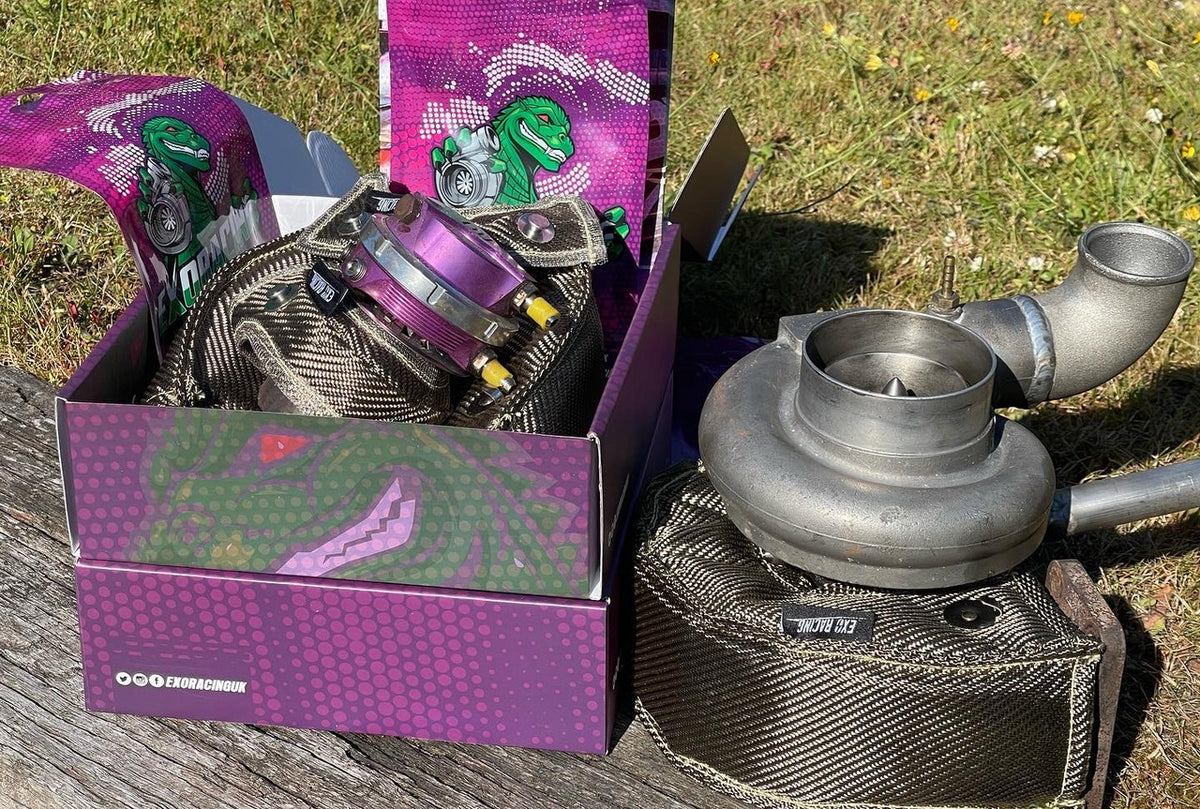 Exoracing external wastegate blanket protecting nearby vacuum lines