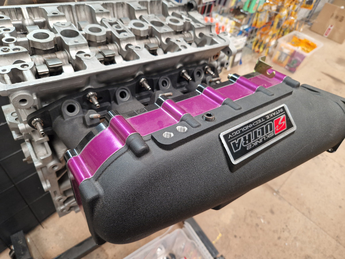 Titanium manifold studs installed on Honda K-Series intake manifold
