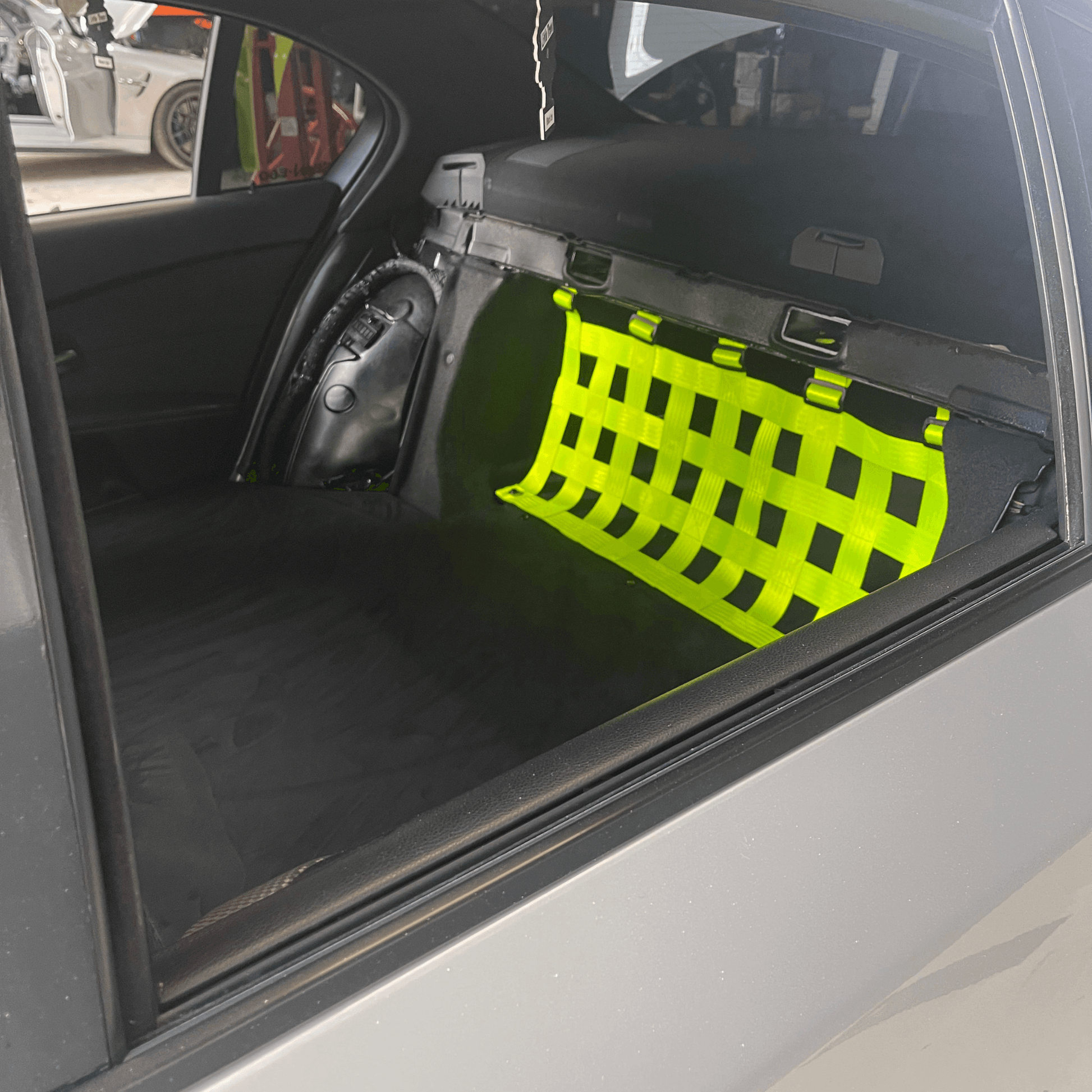 BMW 5 Series E60 M5 Strut bar and Cargo net cargo-nets.co.uk
