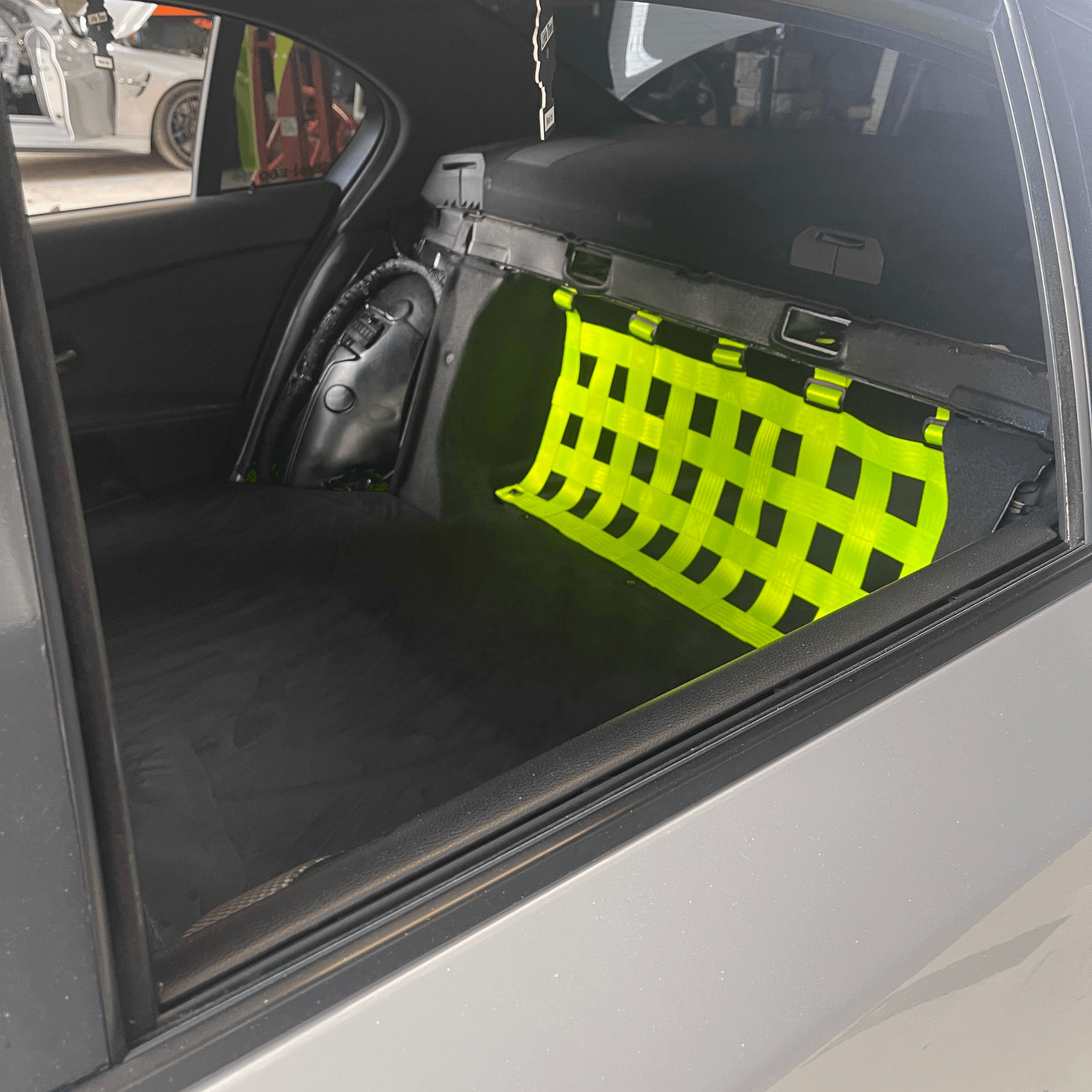 BMW 5 Series E60 M5 Strut bar and Cargo net cargo-nets.co.uk