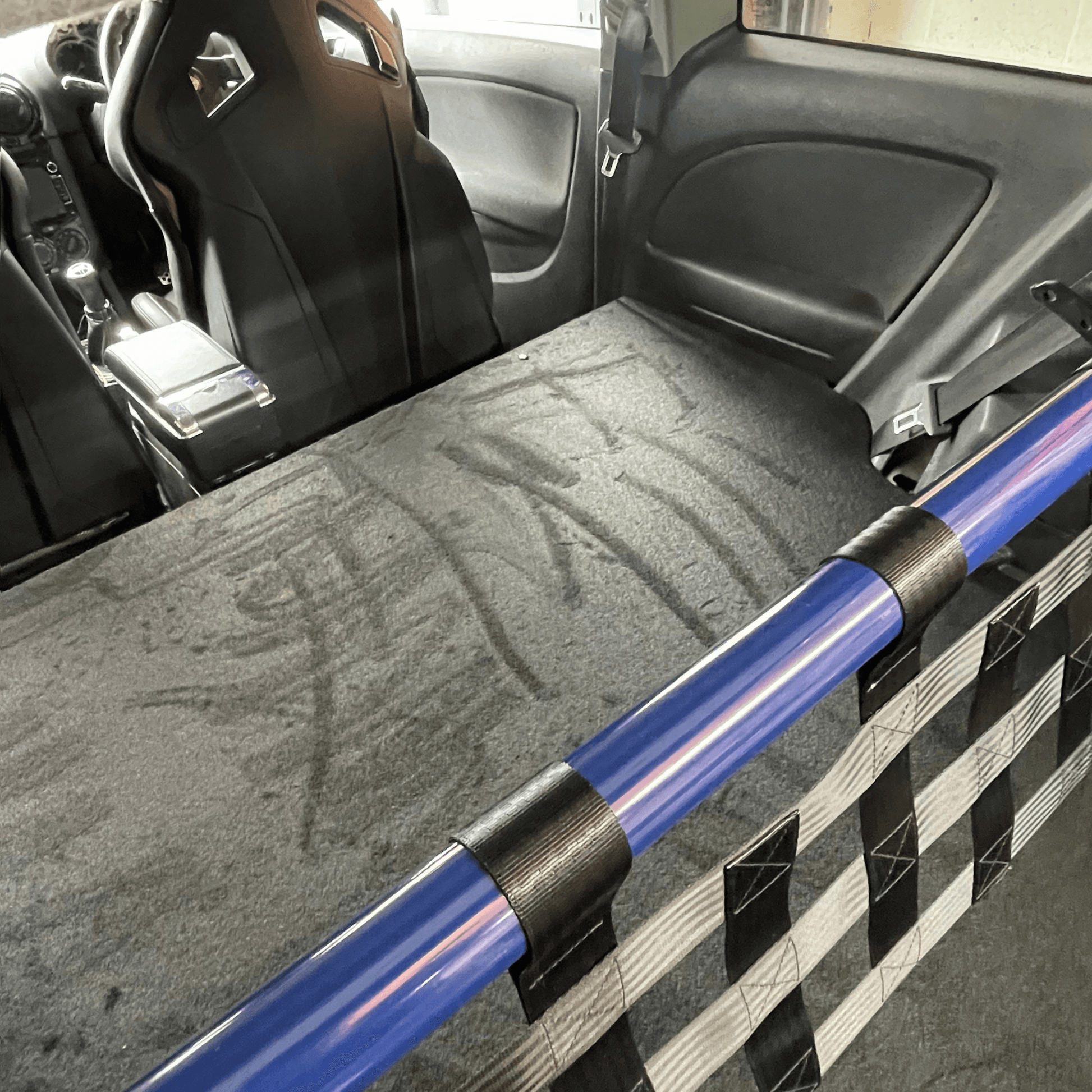 Vauxhall Corsa E Strut bar and Cargo net cargo-nets.co.uk