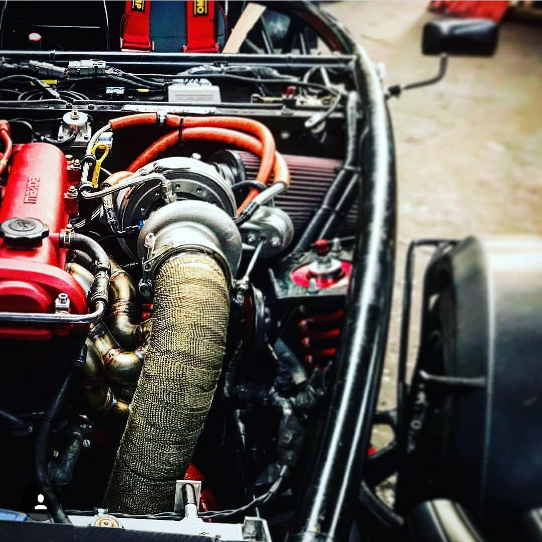 Exoracing titanium fibreglass exhaust wrap texture close up