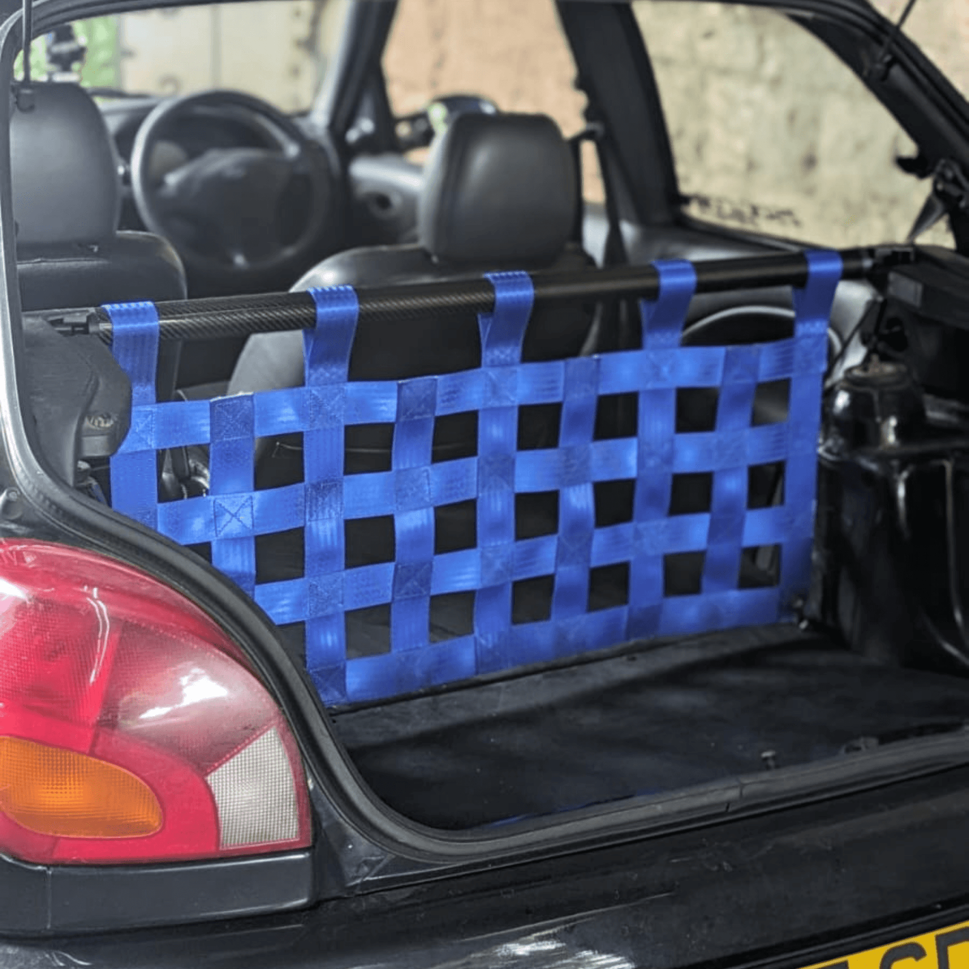 Ford Fiesta Mk4 Mk5 Zetec S Strut bar and Cargo net cargo-nets.co.uk