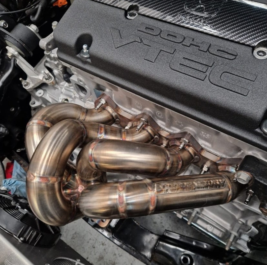 Titanium exhaust manifold studs fitted to Honda engine