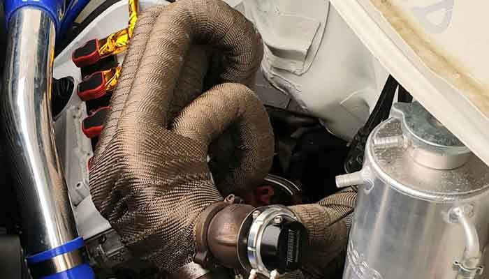 Exoracing exhaust wrap smoking during first heat cycle