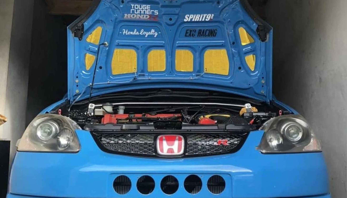 Heat reflective sheet installed on engine bay bulkhead