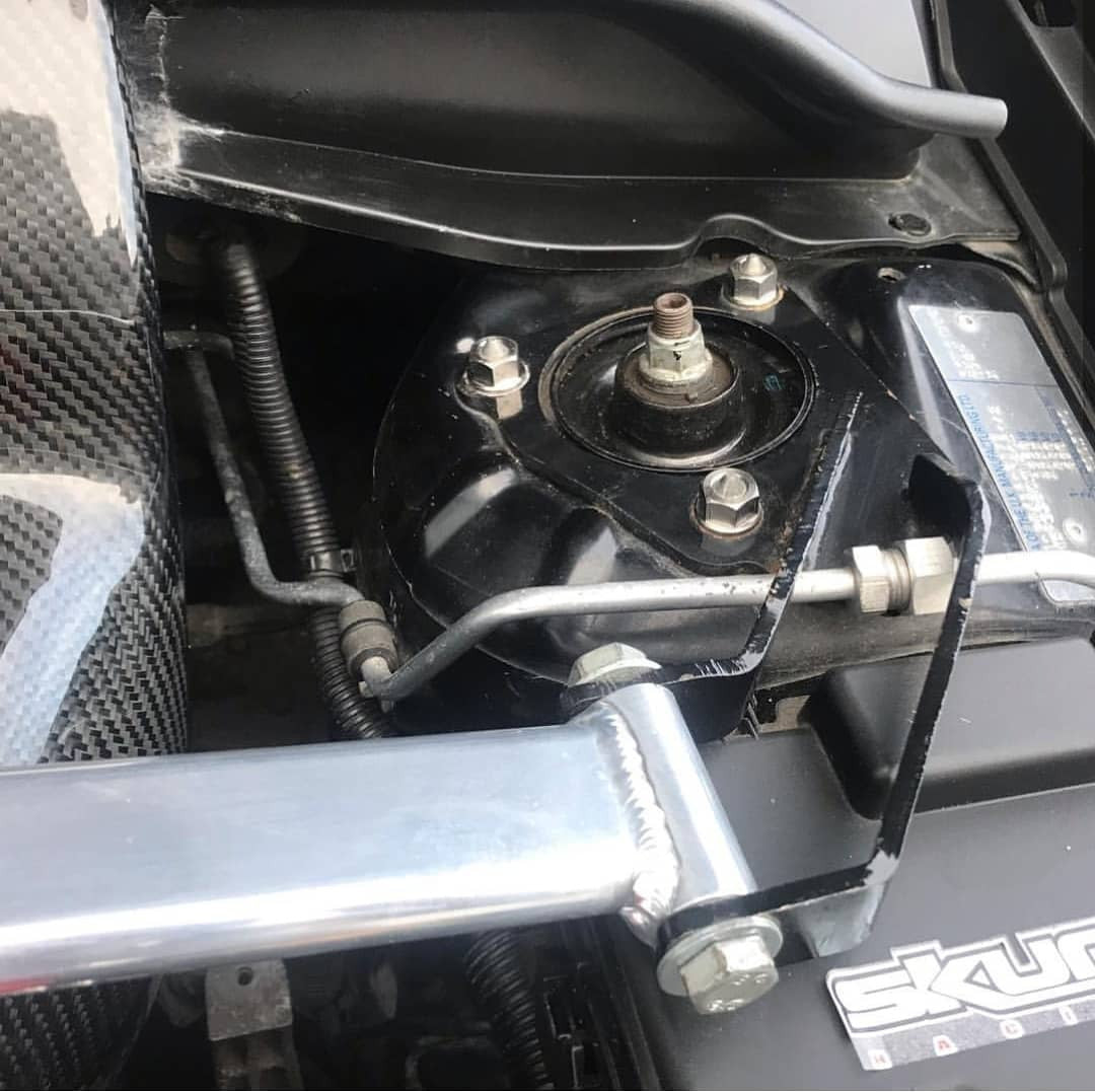 Exoracing titanium strut top nut fitted to Honda suspension tower